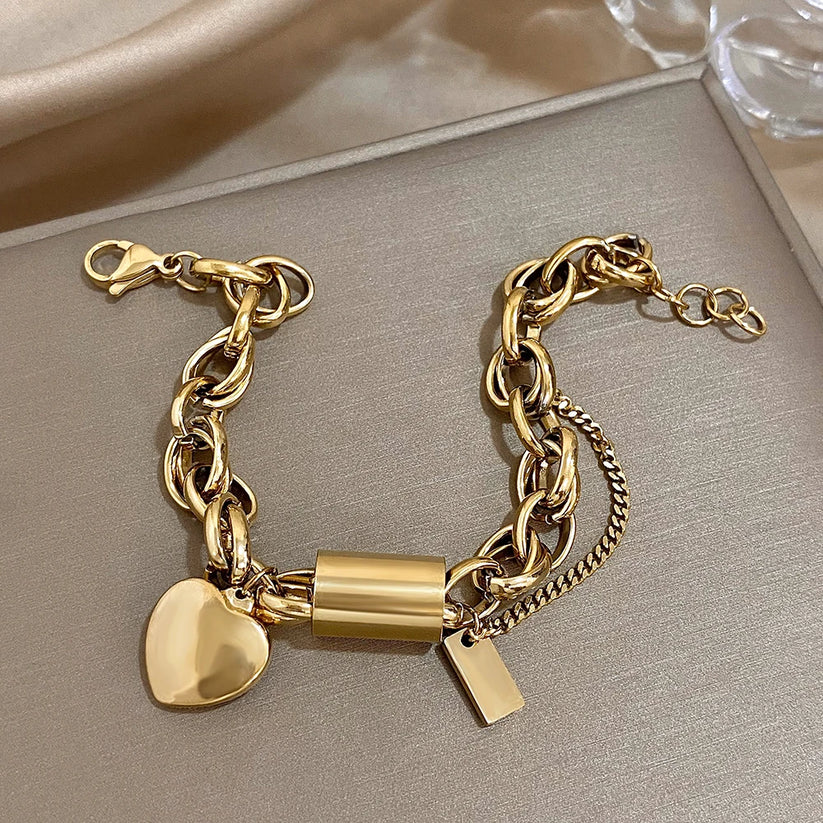 Pulsera gruesa de corazón de oro
